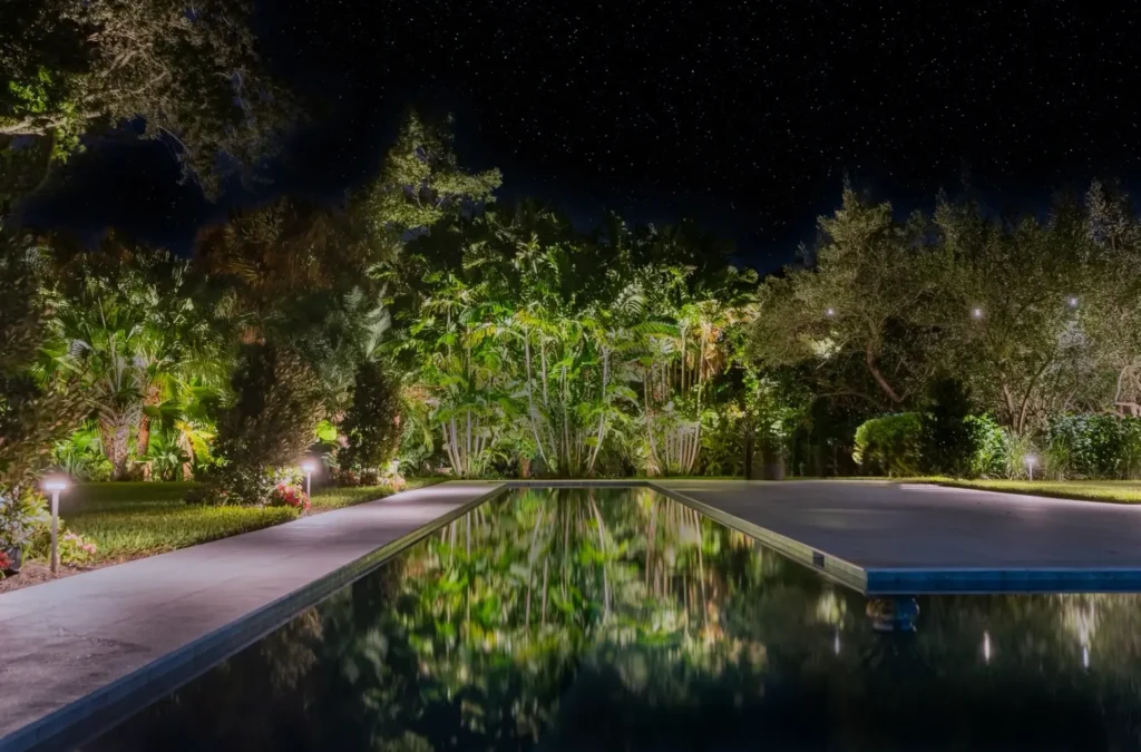 Landscape Lighting in Outdoor Pool Area by Southern Nights LED Landscape Lighting in Vero Beach